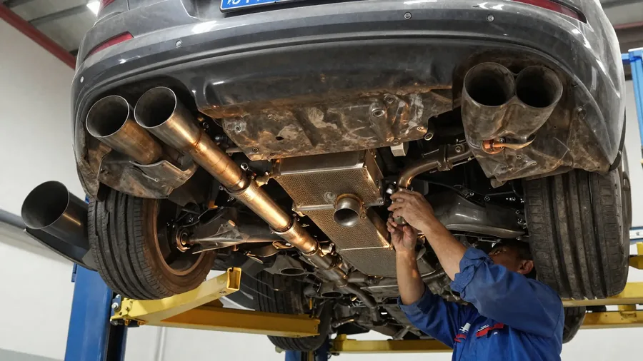 Exhaust and muffler service from below